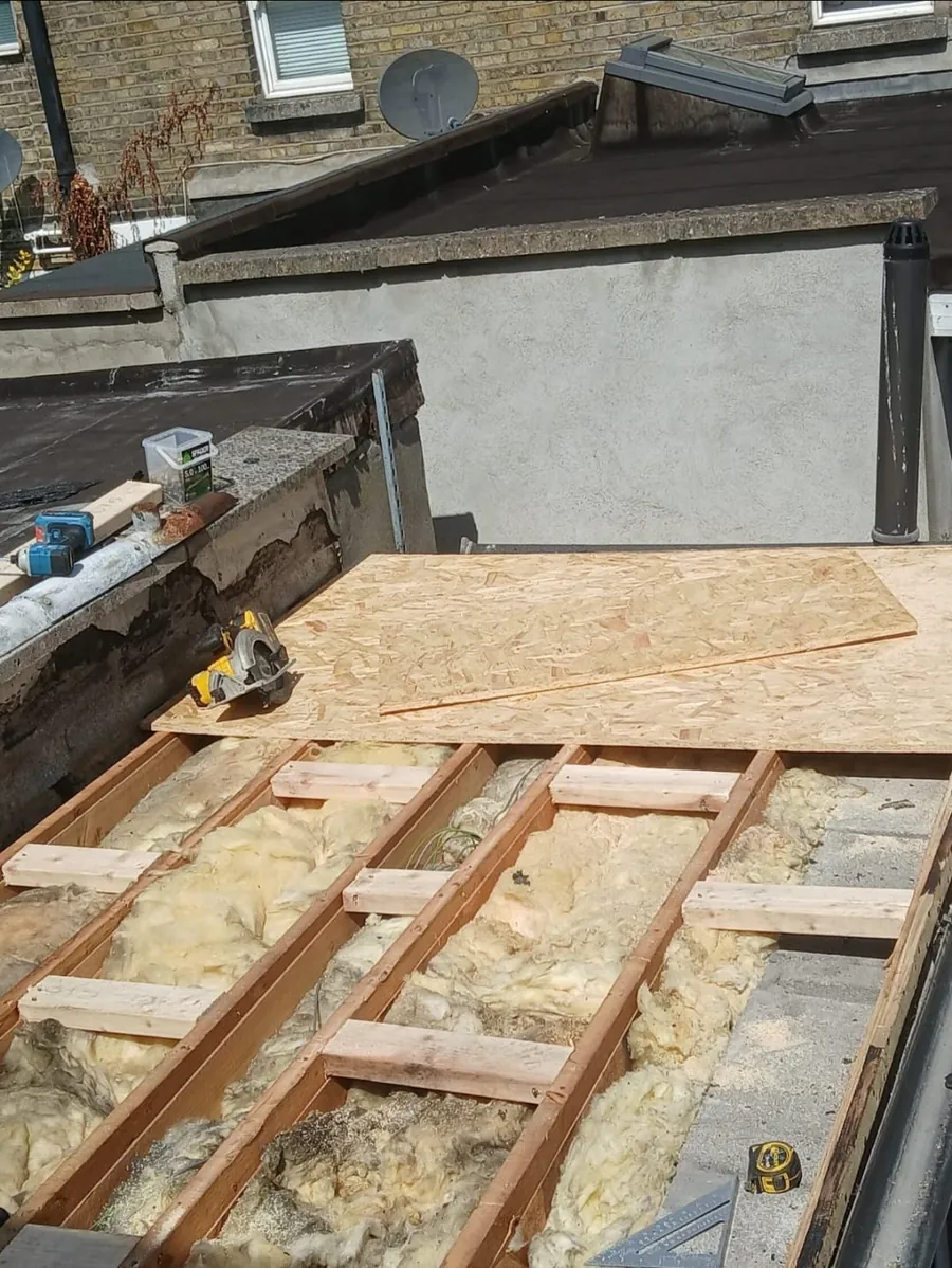 New flat roof joists and insulation going in before the deck, Global Roofing and Guttering, Dublin