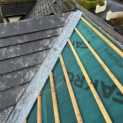 New slates going on up to the lead valley, Global Roofing and Guttering, Dublin